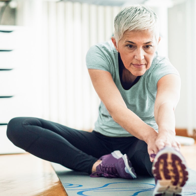 woman does stretching exercises