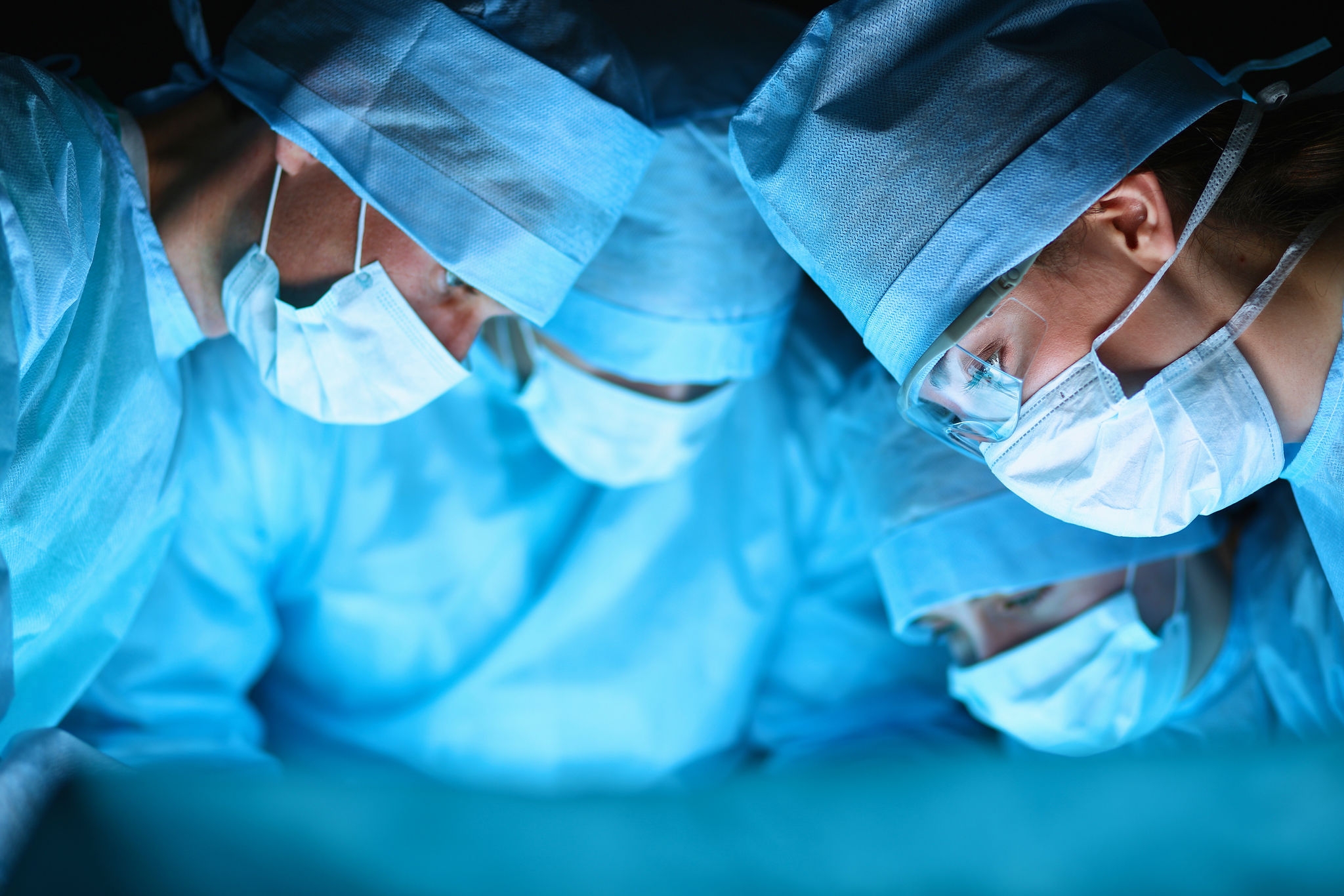 Young surgery team in the operating room .